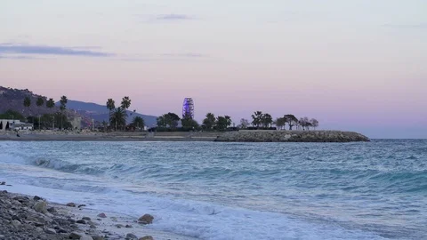 Slowmotion of waves breaking on the pebble beach, Mentone, French Riviera Stock Footage 120728882