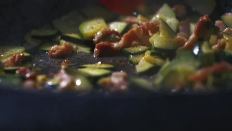Slowmotion zucchini and bacon Stock Footage