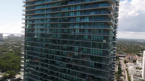 SLS Brickell Building Reflections right to left by Drone 4k Stock Footage 127206901