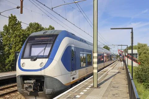 SLT sprinter NS train for local passengers at Nieuwerkerk aan den IJssel St.. Stock Photos