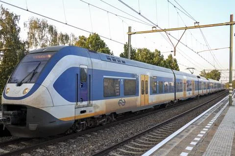 SLT sprinter NS train for local passengers at Nieuwerkerk aan den IJssel St.. Stock Photos