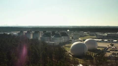 Sludge digester tanks processing urban wastewater for metropolitan area Video stock 329696010