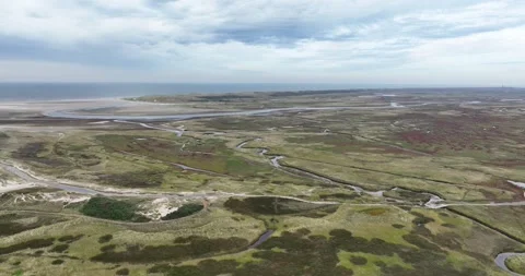 The Slufter, beach plain on the Dutch Wadden Island of Texel, at the North Sea Stock Footage 289564598