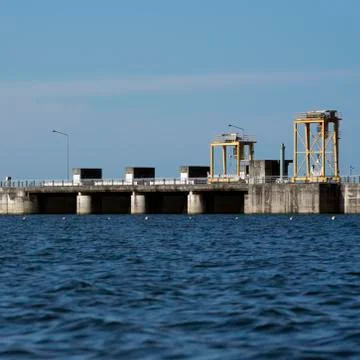 Sluice in the dam. Stock Photos