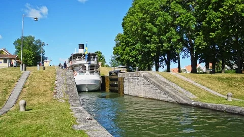 Sluice gate closing behind passenger ship Diana Stock Footage 95116915