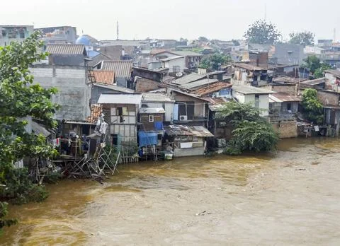 Slum scenery near Jakarta in Java Slum scenery near at a river near Jakart... Fotos Stock