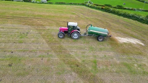 Slurry Spreading, wide, side shot Stock Footage 243032371