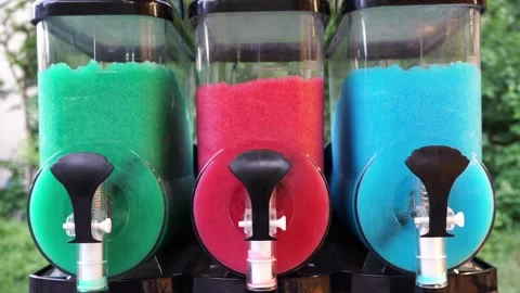 Slush ice maker, slushy ice machine, Slushie frozen drink containers Stock Footage 312890066