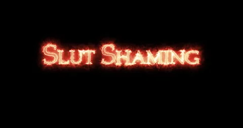 Slut shaming written with fire. Loop Stock Footage 295179269