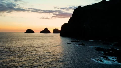 Small 3 islands in the mountains at sunset view from a drone Stock Footage 256576564
