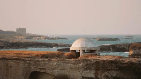 A small abandoned bunker from World War II. Landscape view of Salento coast in Vídeos de archivo 298135626
