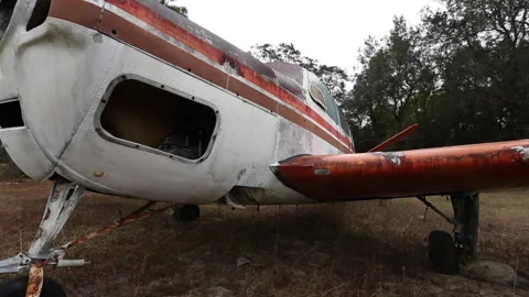 Small Abandoned Plane In Field From Front Wide Shot 스톡 동영상 147005448