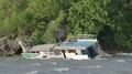 Small abandoned ship wreck at windy rocky mountain cliff 4k or 4k+ Resolution