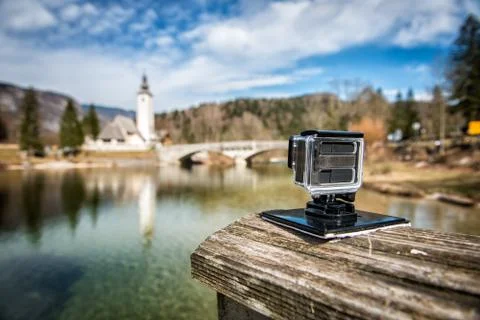 Small action camera filming nice landscape slow motion outdoors Stock Photos