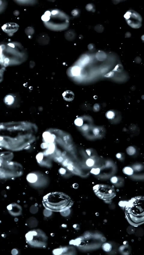 Small air bubbles underwater. Filmed on a high-speed camera at 1000 fps Stock Footage 335377730