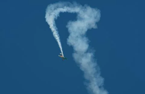 Small aircraft flying high Stock Photos