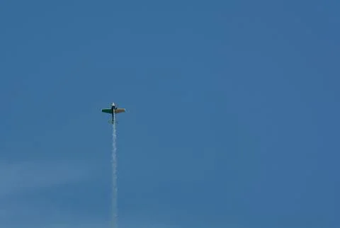 Small aircraft flying high Stock Photos