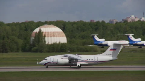 A small aircraft has landed on the strip and is traveling slowing down speed Stock Footage 92199201