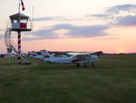 Small airfield at sunset Stock Photos