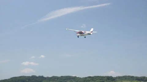 Small airplane fly by close and low Stock-Footage 27716778