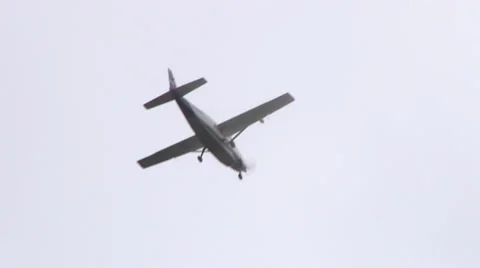 Small Airplane Flying on Cloudy Day Stock Footage 35865214