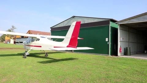 Small airplane on the grass Stock Footage 69771274