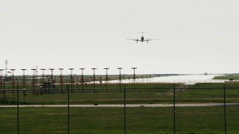 Small airplane landing Stock Footage 282304023