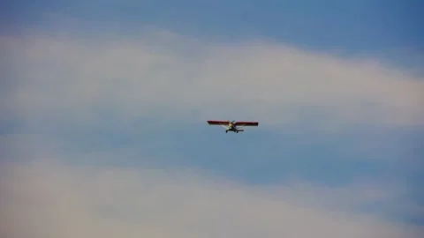 Small Airplane With Propeller Flies Across The Sky Stock Footage 161073045