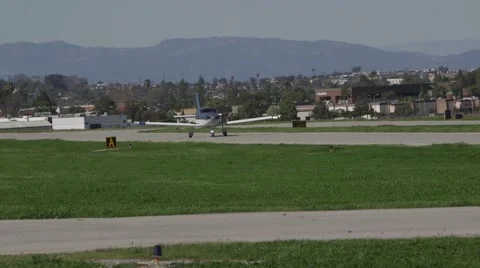 Small airplane on runway Stock Footage 49549225