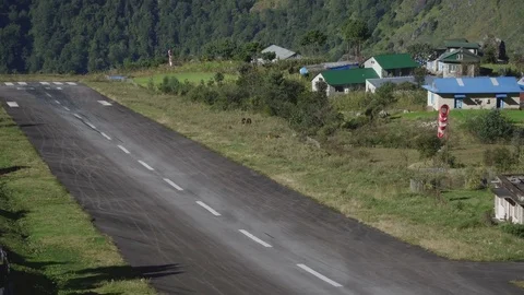 Small airplane take off from Tenzing-Hillary Airport in Lukla to Kathmandu. Stock Footage 83036811