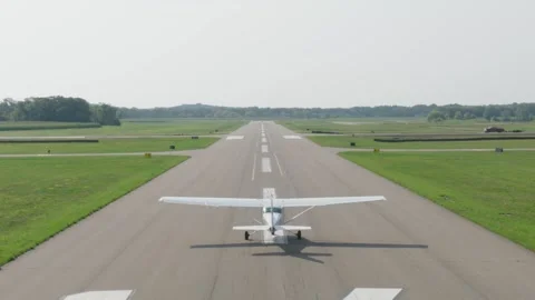 Small Airplane Taking Off Rural Runway Chase View Stock Footage 342573812