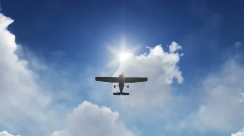 Small Airplane taking off with a sun and clouds background Vídeos de archivo 41473067