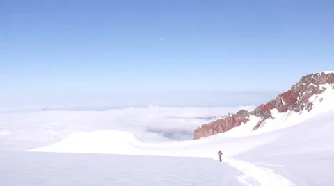 Small Alpine climber going back from the mountain Stock Footage 43248947