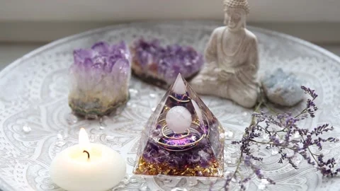 Small altar with Orgonite or Orgone pyramid in home interior. Stock Footage 169640614