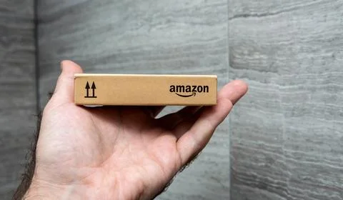 Small Amazon Box Held in Hand Stock Photos