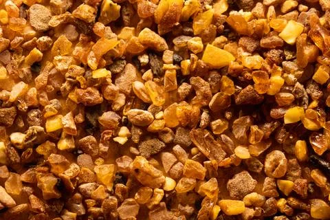 Small amber. Selective focus. Close-up, background and texture Stock Photos