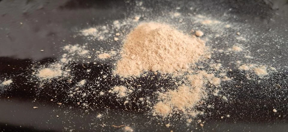 Small amount of ground ginger powder Stock Photos
