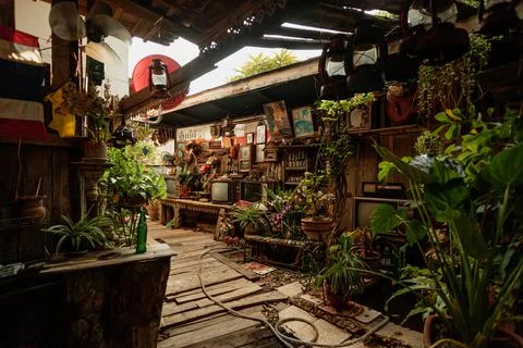 Small and cozy backyard with second hand furniture for sale Stock Photos