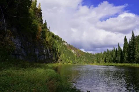 The small and fast Ural river Usva, flowing at the foot of the Usvinskie Stol Stock Photos