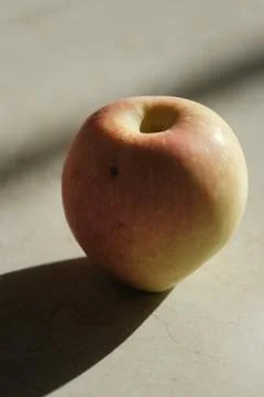 A small apple on table Stock Photos