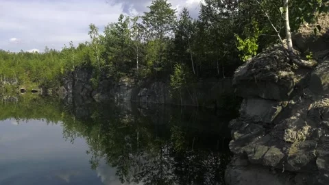 Small area with green grass and moss. Small lake in nature Video stock 102673984