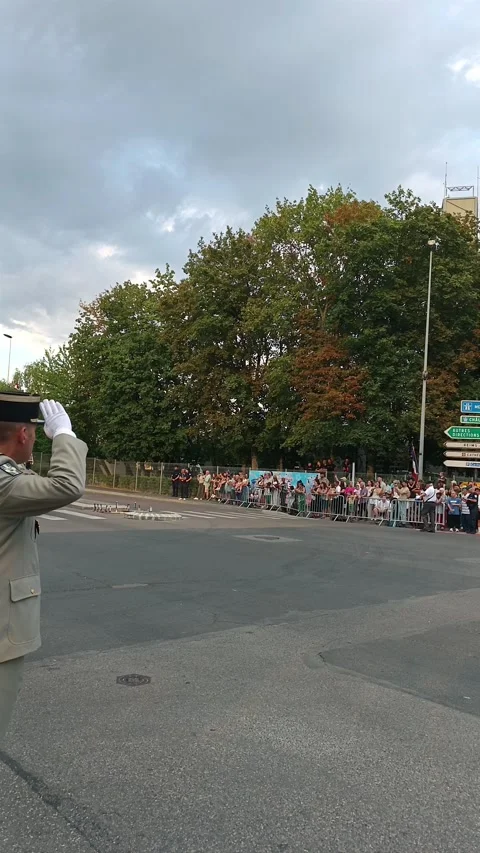 Small Armored Vehicle Passing by Saluting Officers at Reims Parade Video stock 339653079