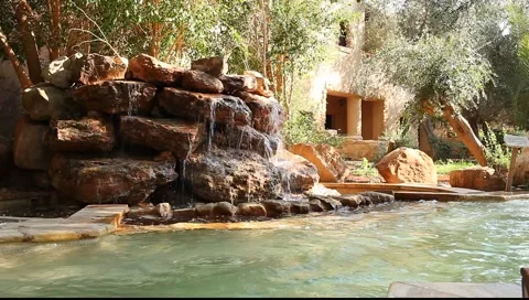 Small artificial waterfall and pool Stock-Footage 2773189