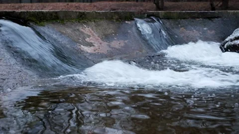Small artificial waterfall Stock Footage 167003776