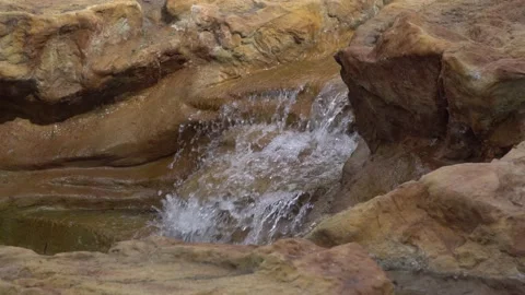 A small artificial waterfall in the park. Stock Footage 234291153
