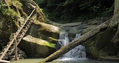 Small artificial waterfall with stairs Stock Footage 159177519