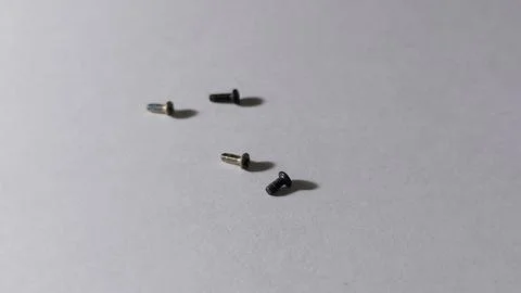 Small Assorted Metal Screws for Electronic and Hardware Repair Set Stock Photos