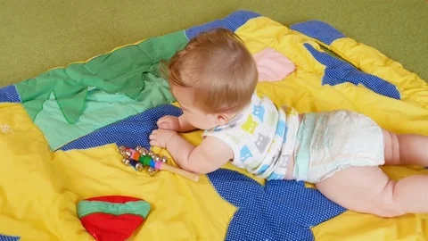 Small Baby Playing Stock Footage 77809329