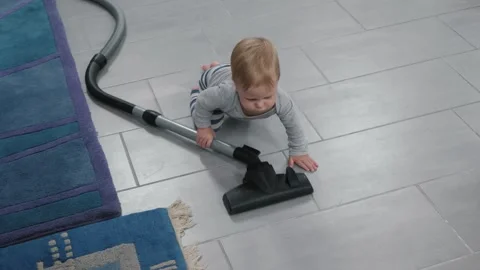 Small baby vacuum cleaner Stock Footage 318419052
