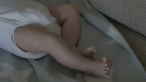 Small baby's legs Stock Footage 80460340